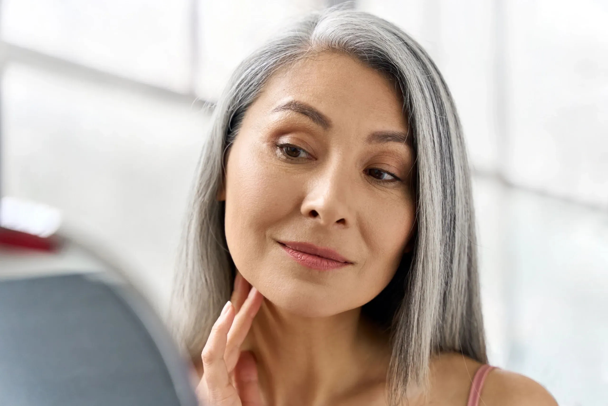Woman with smooth, refreshed skin at Heritage Wellness & Med Spa Crescent Springs